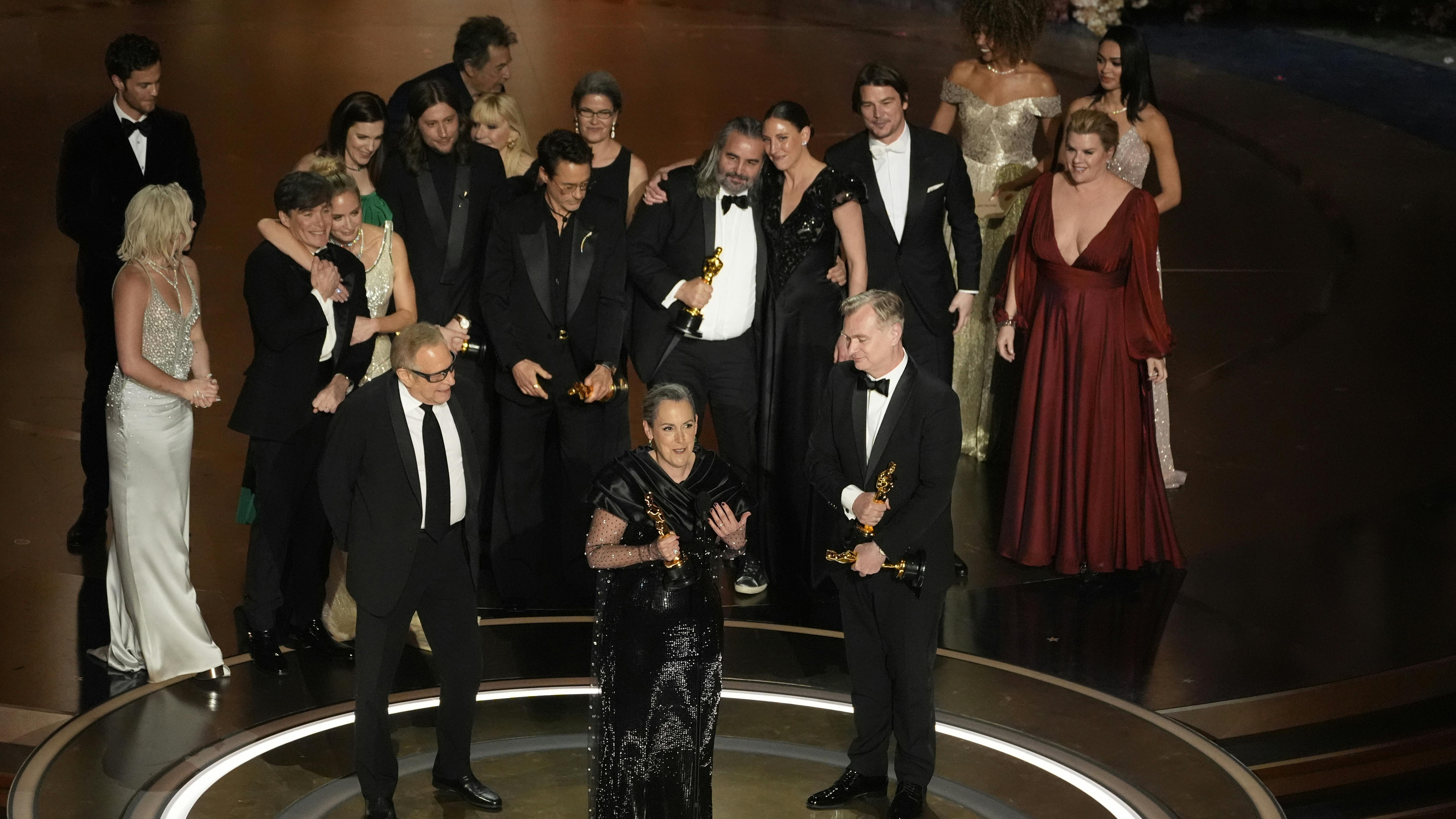 The cast and crew of "Oppenheimer" accept the award for best picture during the Oscars on Sunday, March 10, 2024, at the Dolby Theatre in Los Angeles. (AP Photo/Chris Pizzello)
