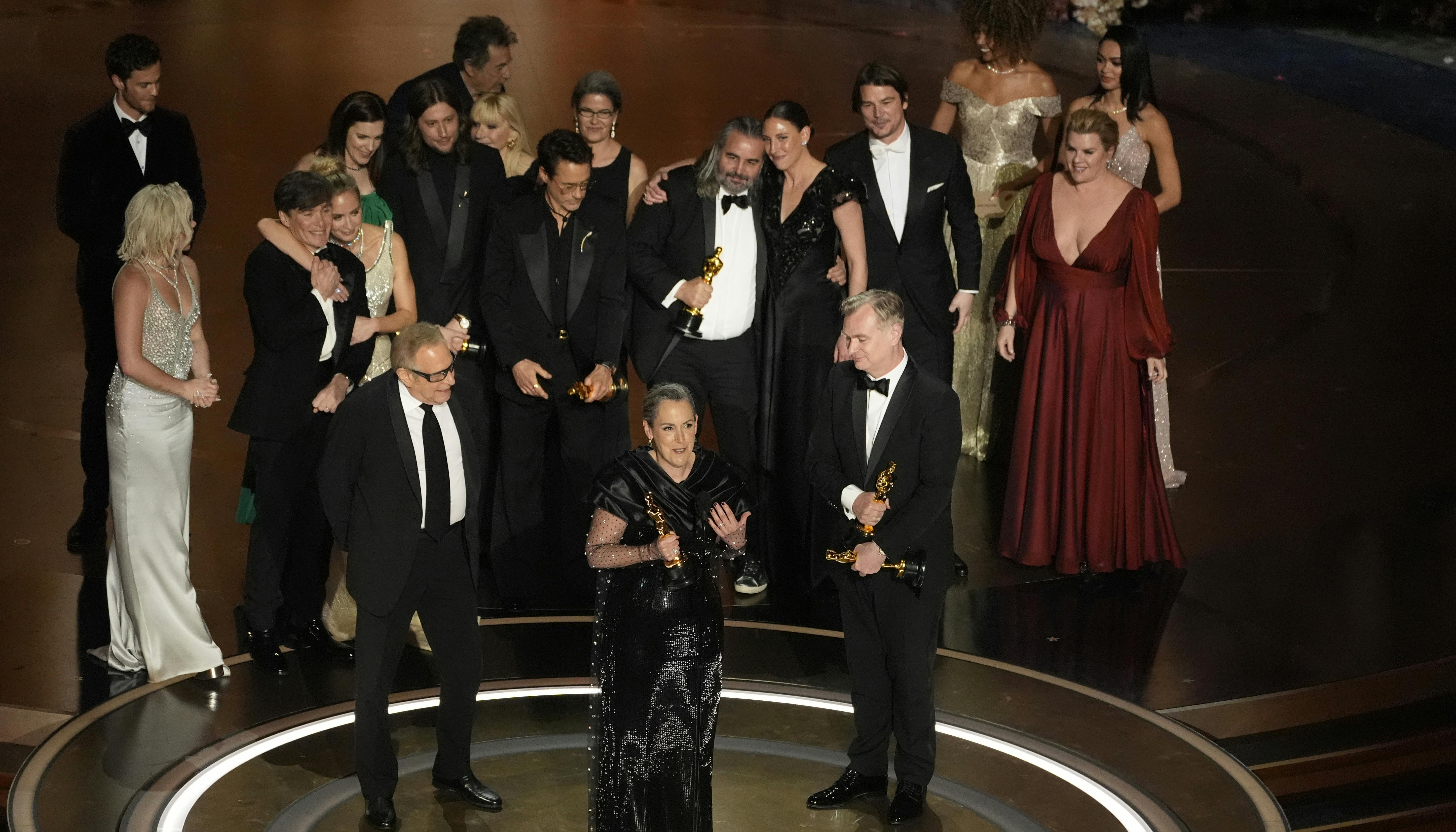 The cast and crew of "Oppenheimer" accept the award for best picture during the Oscars on Sunday, March 10, 2024, at the Dolby Theatre in Los Angeles. (AP Photo/Chris Pizzello)
