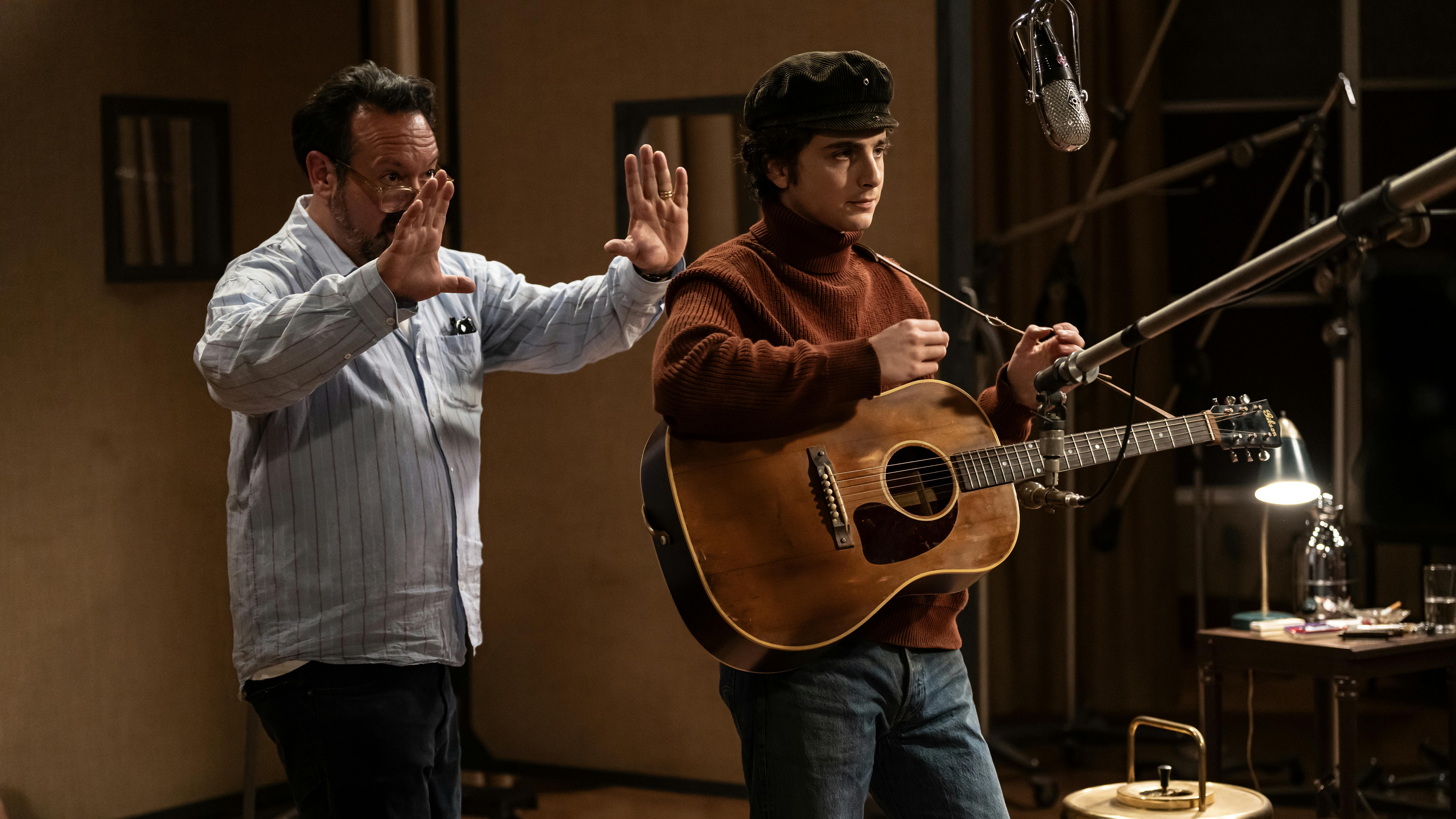 Director James Mangold and Timothée Chalamet on the set of A COMPLETE UNKNOWN. Photo by Macall Polay, Courtesy of Searchlight Pictures. © 2024 Searchlight Pictures All Rights Reserved.