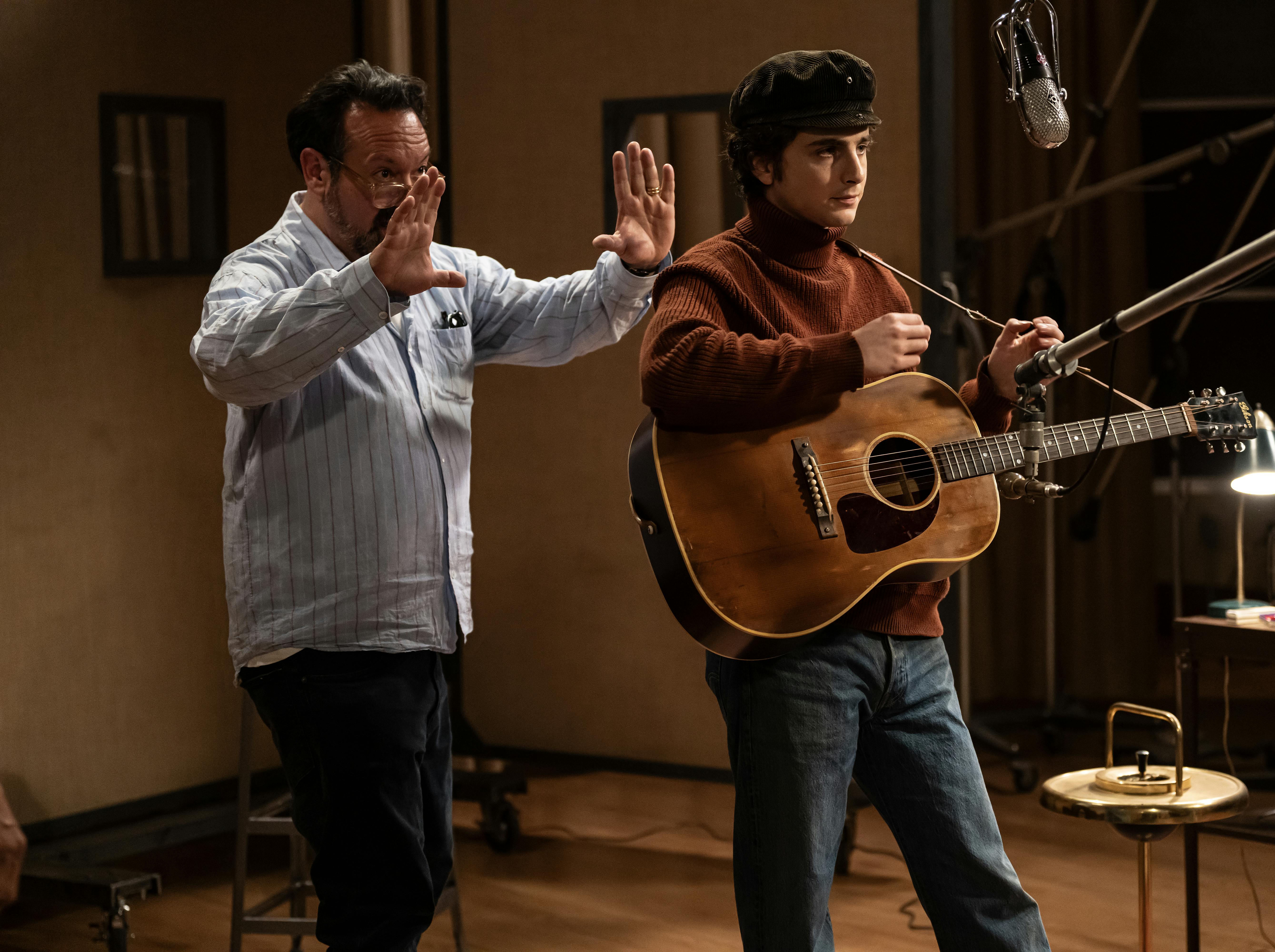 Director James Mangold and Timothée Chalamet on the set of A COMPLETE UNKNOWN. Photo by Macall Polay, Courtesy of Searchlight Pictures. © 2024 Searchlight Pictures All Rights Reserved.