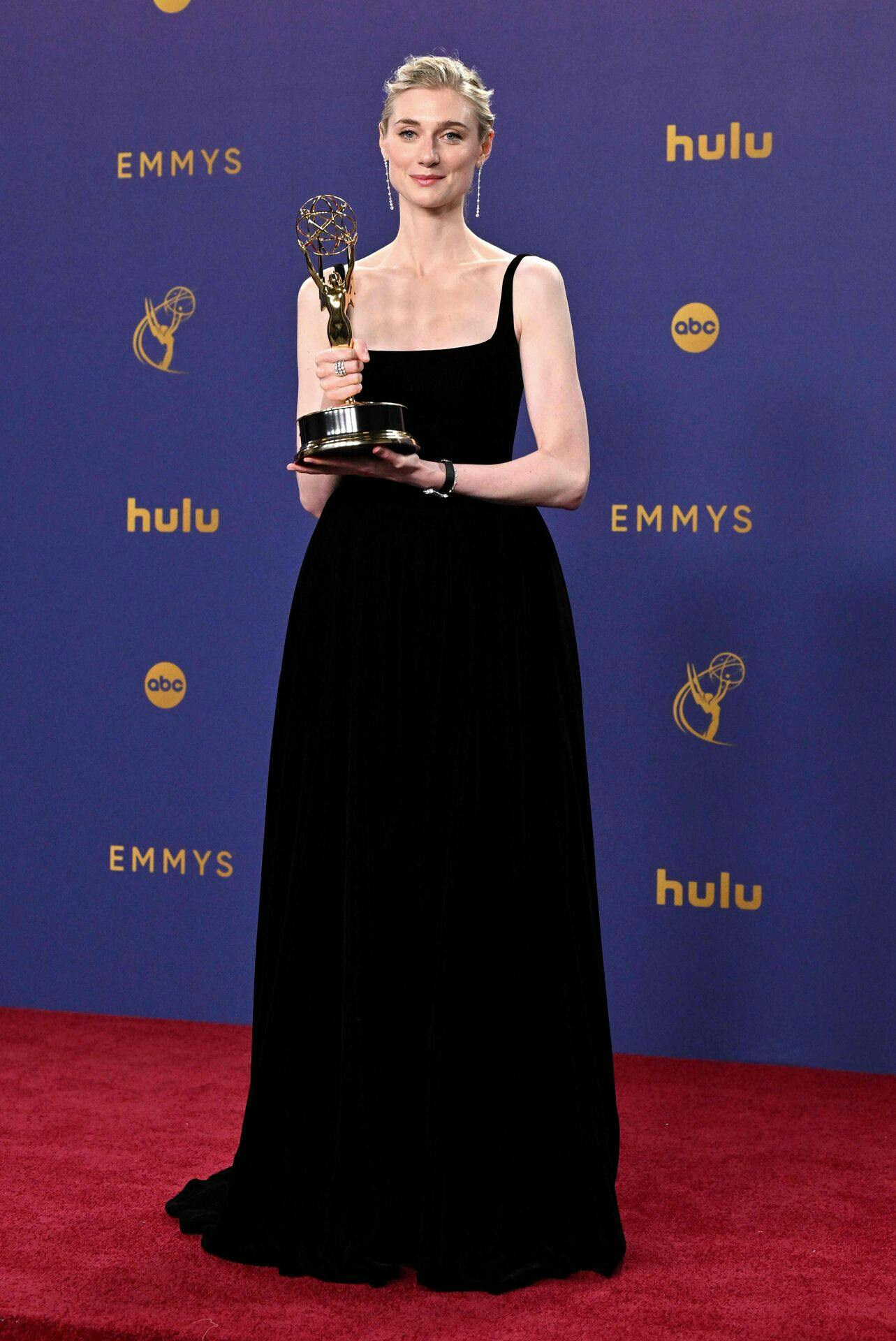 Australian actress Elizabeth Debicki poses in the press room with the Outstanding Supporting Actress in a Drama Series for "The Crown" during the 76th Emmy Awards at the Peacock Theatre at L.A. Live in Los Angeles on September 15, 2024. (Photo by Robyn Beck / AFP)