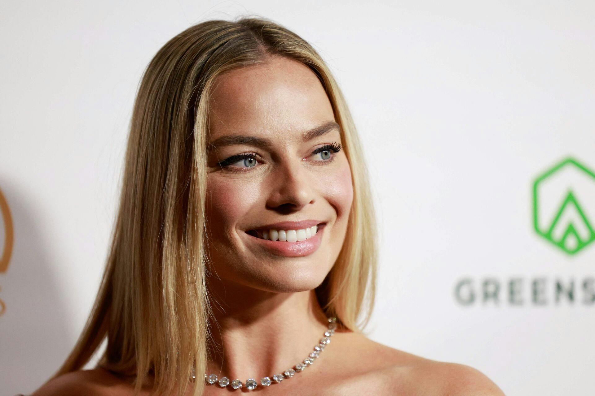 Australian actress Margot Robbie arrives for the 35th Annual Producers Guild Awards at the Ray Dolby Ballroom Ovation Hollywood on February 25, 2024, in Hollywood, California. (Photo by Michael Tran / AFP)