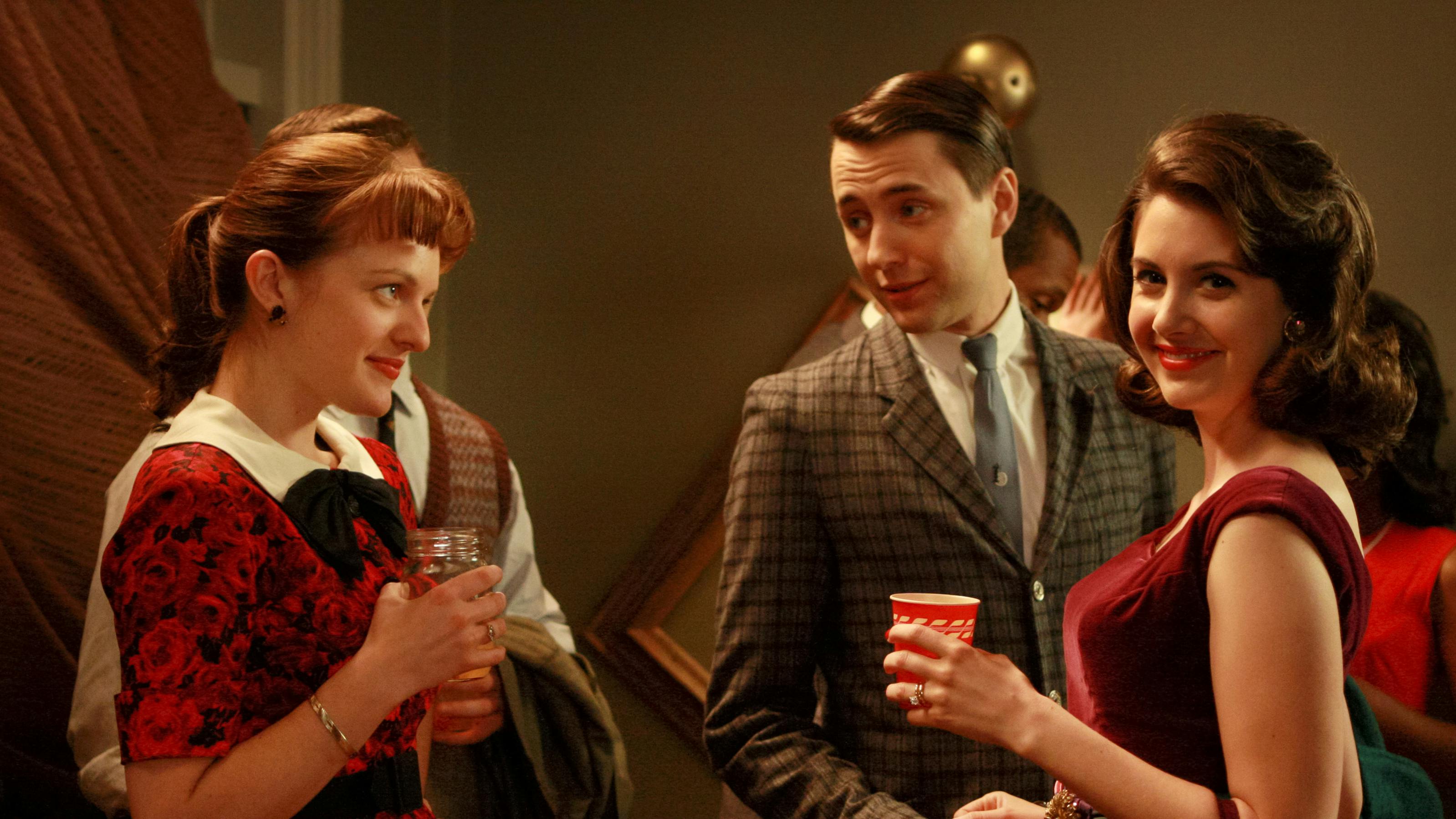 Alison Brie (right) as Trudy Campbell on <em>Mad Men.</em>