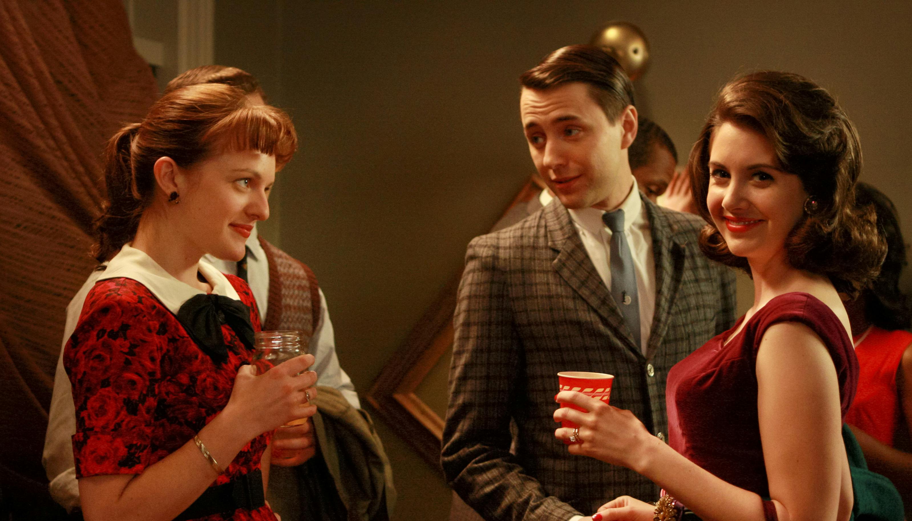 Alison Brie (right) as Trudy Campbell on <em>Mad Men.</em>