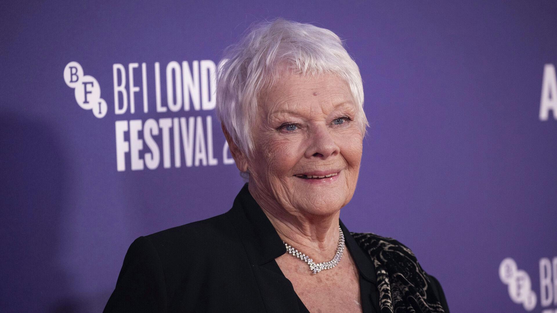 Judi Dench poses for photographers upon arrival for the premiere of the film 'Allelujah' during the 2022 London Film Festival in London, Sunday, Oct. 9, 2022. (Photo by Vianney Le Caer/Invision/AP)
