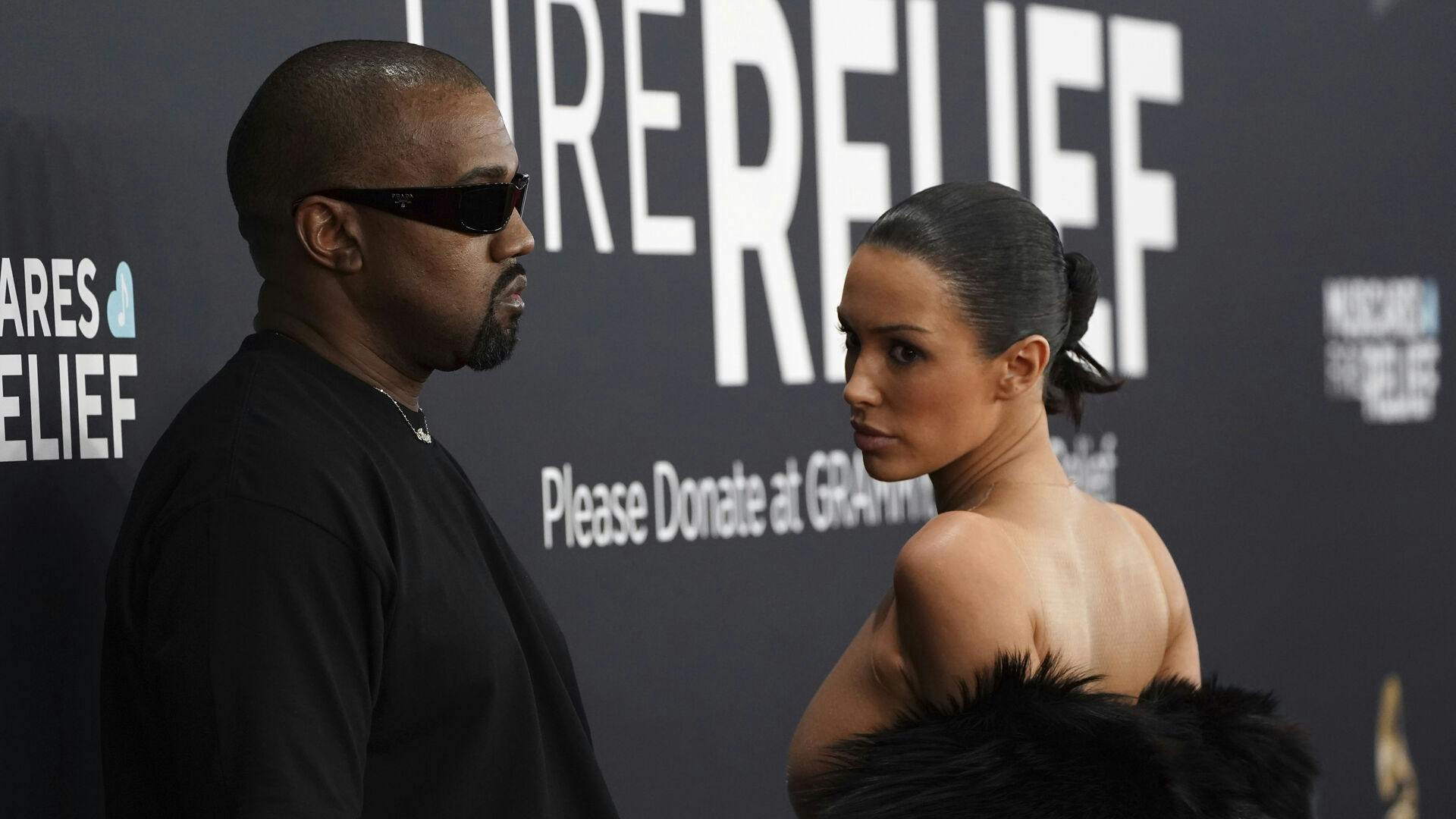 Kanye West, left, and Bianca Censori arrive at the 67th annual Grammy Awards on Sunday, Feb. 2, 2025, in Los Angeles. (Photo by Jordan Strauss/Invision/AP)