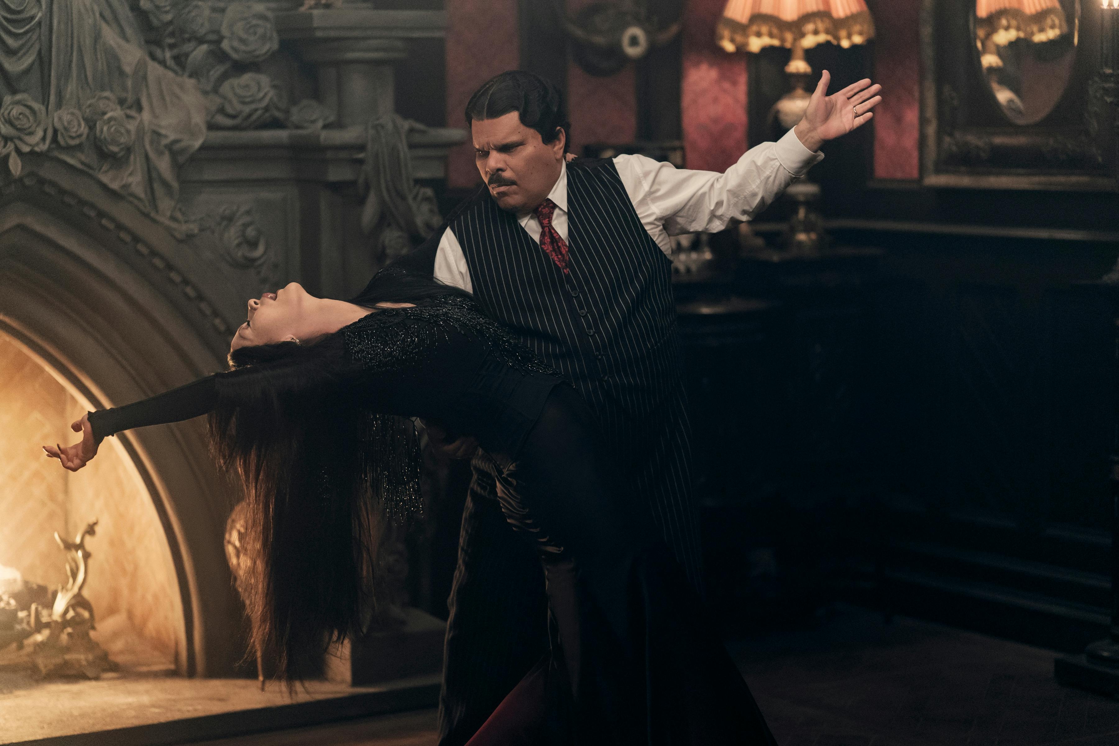 Wednesday. (L to R) Catherine Zeta-Jones as Morticia Addams, Luis Guzmán as Gomez Addams in episode 203 of Wednesday. Cr. Jonathan Hession/Netflix © 2025