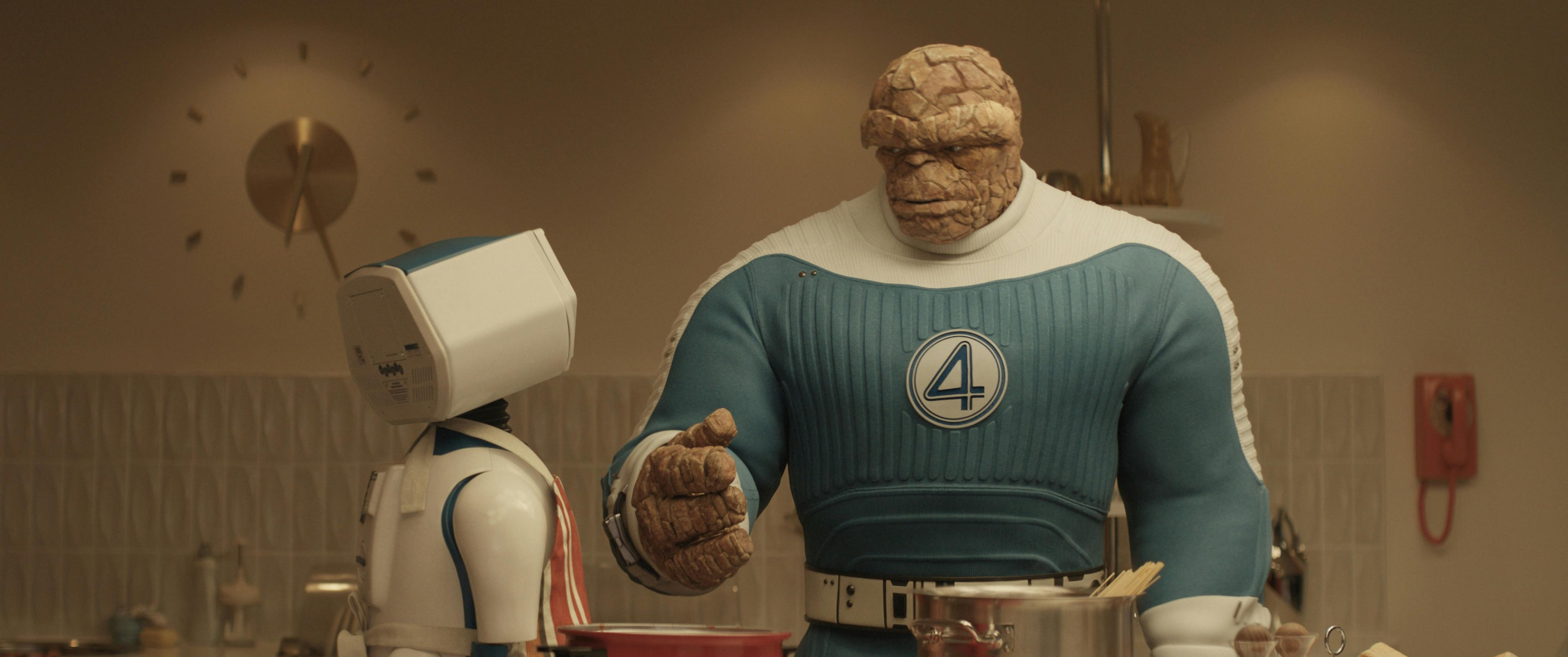 (L-R) H.E.R.B.I.E and Ebon Moss-Bachrach as Ben Grimm/The Thing in 20th Century Studios/Marvel Studios' THE FANTASTIC FOUR: FIRST STEPS. Photo courtesy of 20th Century Studios/Marvel Studios. © 2025 20th Century Studios / © and ™ 2025 MARVEL.