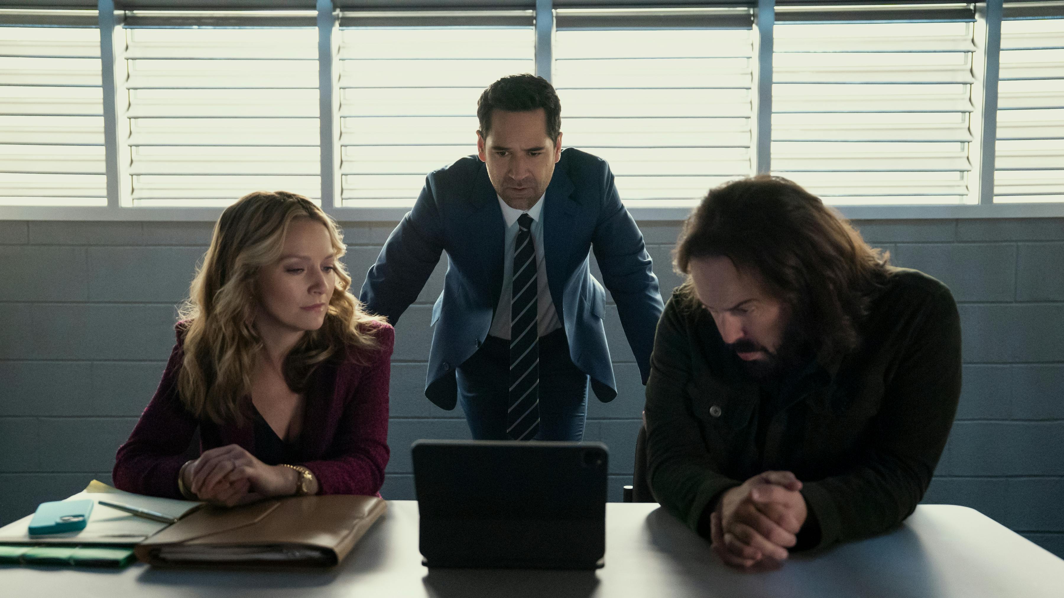 The Lincoln Lawyer. (L to R) Becki Newton as Lorna Crane, Manuel Garcia-Rulfo as Mickey Haller, Angus Sampson as Denis "Cisco" Wojciechowski in episode 402 of The Lincoln Lawyer. Cr. Kim Alexis/Netflix © 2026