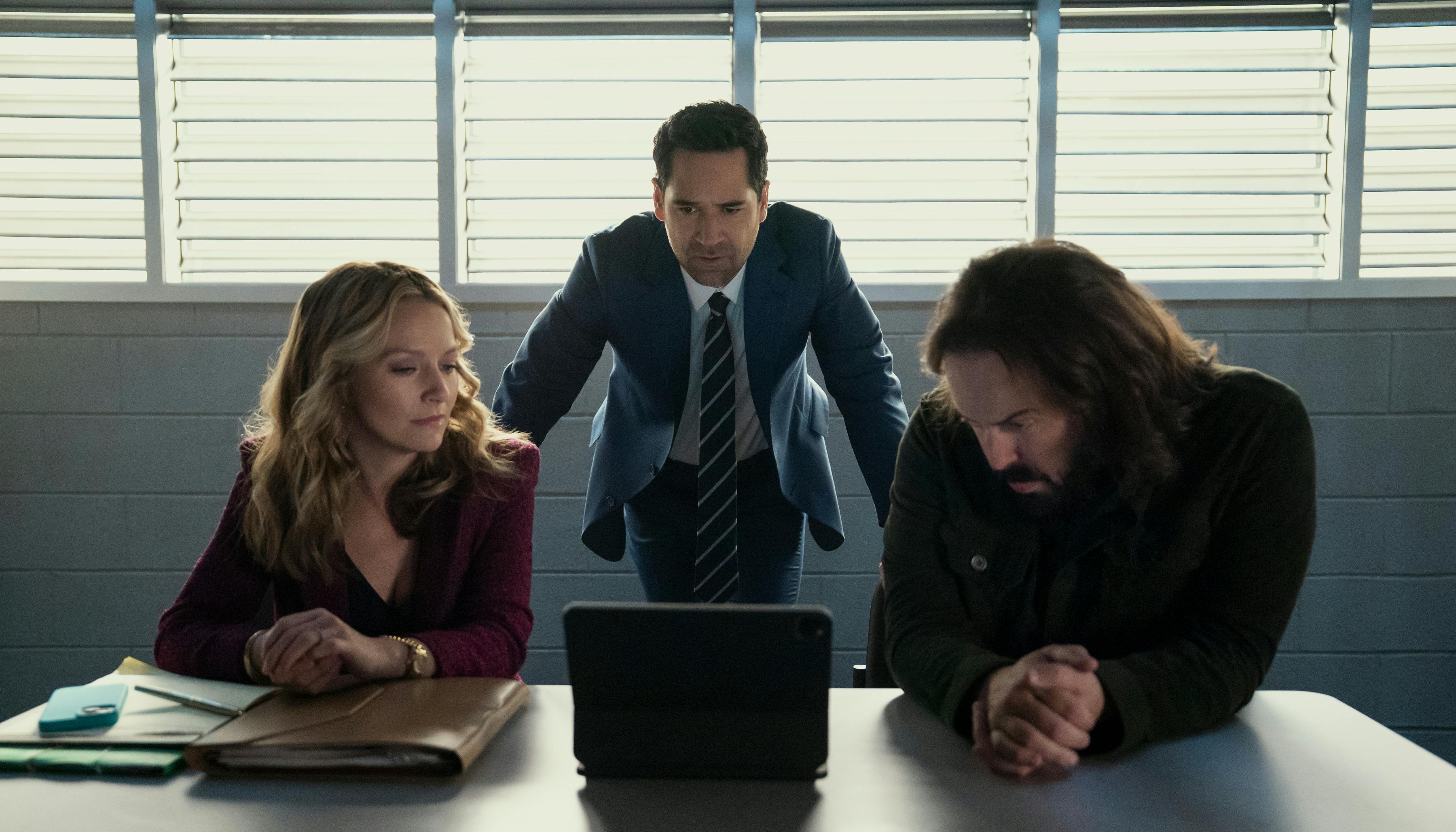 The Lincoln Lawyer. (L to R) Becki Newton as Lorna Crane, Manuel Garcia-Rulfo as Mickey Haller, Angus Sampson as Denis "Cisco" Wojciechowski in episode 402 of The Lincoln Lawyer. Cr. Kim Alexis/Netflix © 2026